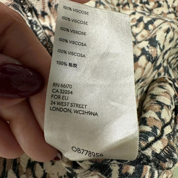 Free People Wrap French Quarter Mini Dress Size Small animal
Print - Picture 8 of 9